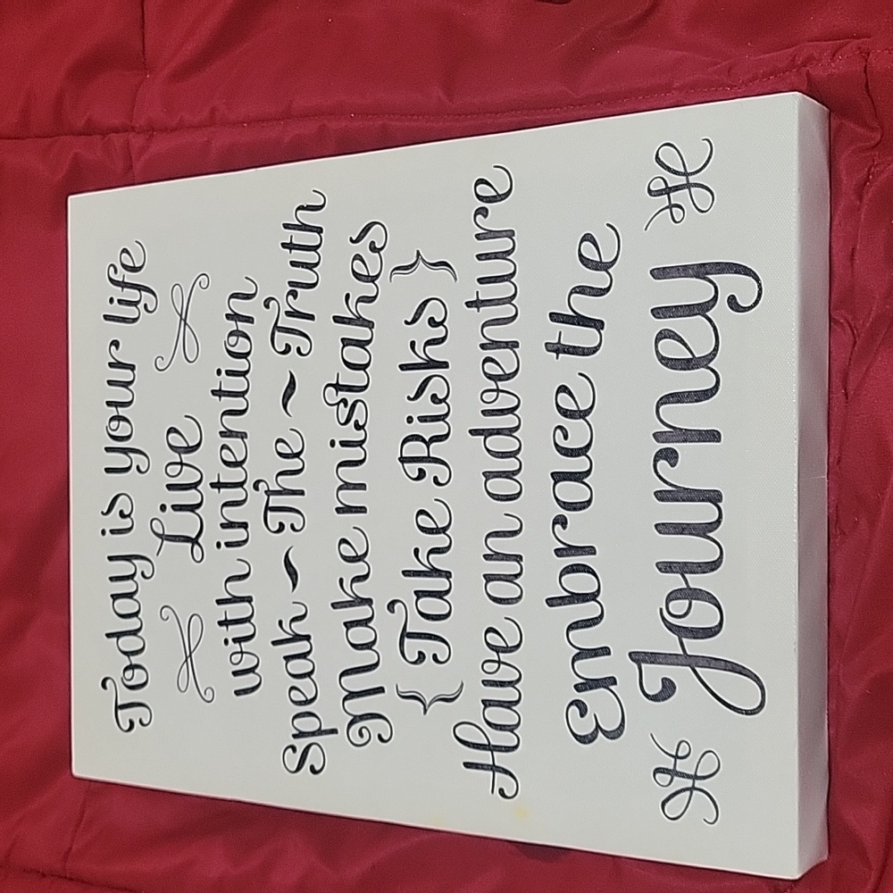 Motivational wall hanging.